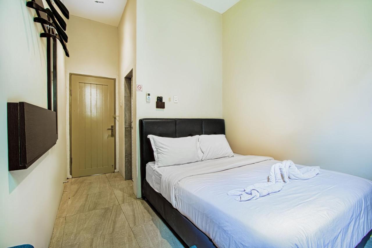 Vosstel Guest House Medan Buitenkant foto
