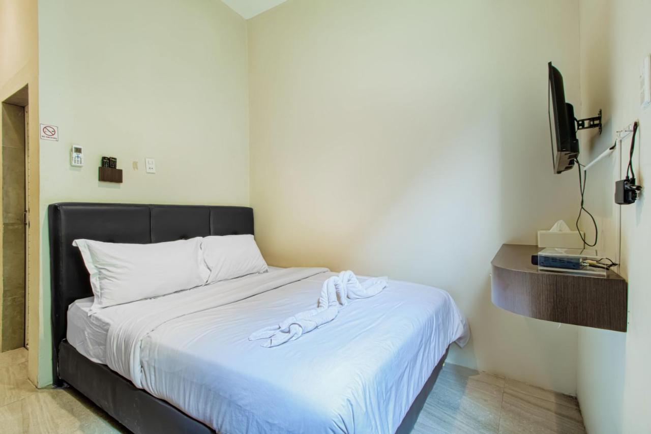 Vosstel Guest House Medan Buitenkant foto